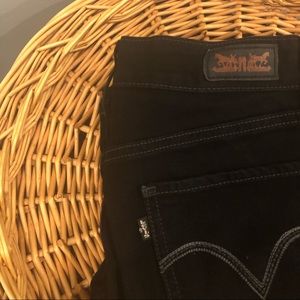 Levi’s black mid rise jeans